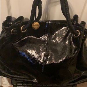 Furla patent leather bag. Never used.New with original dust bag. Hot pink inside